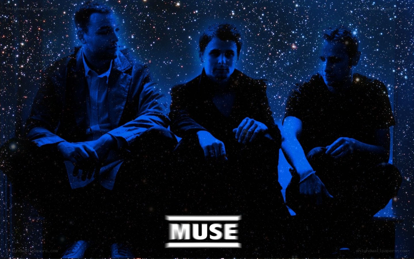 Muse band members in starry background