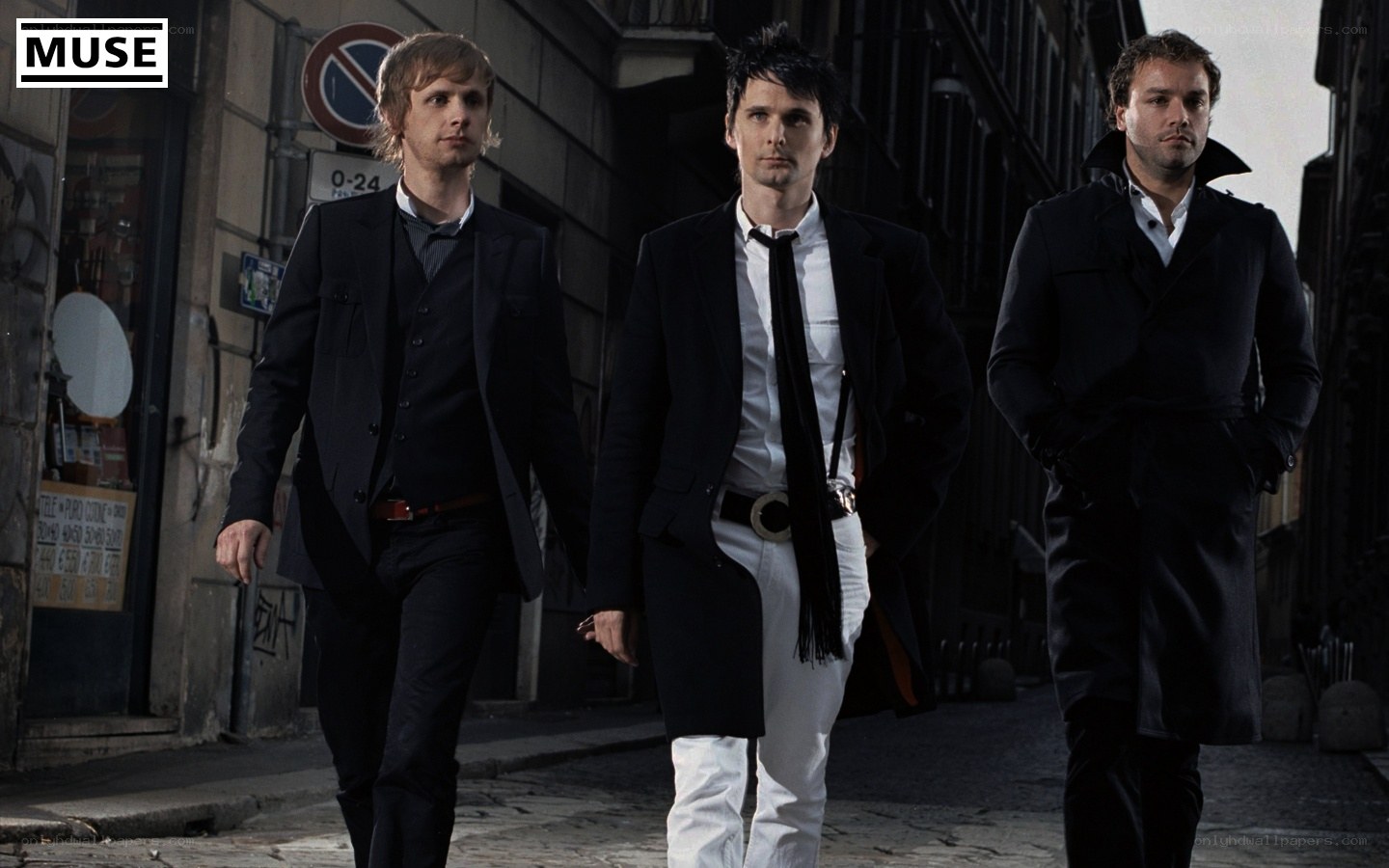 Muse band members walking