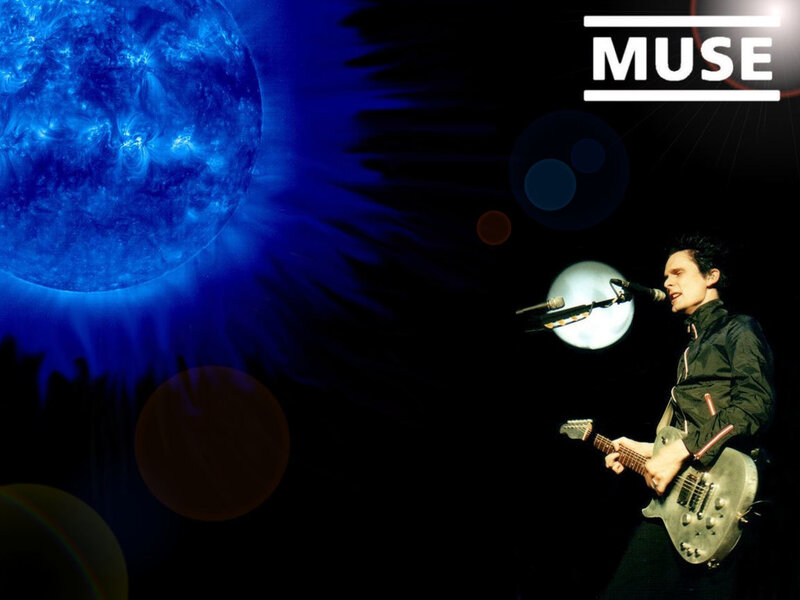 Muse performing on stage
