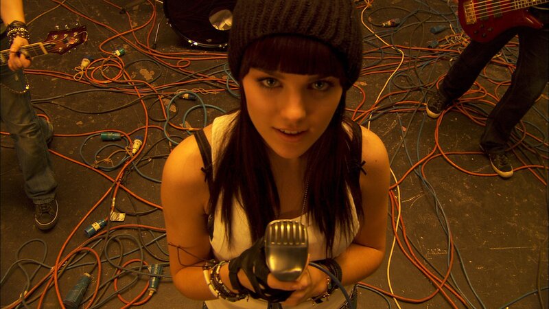 Music band on stage with cables