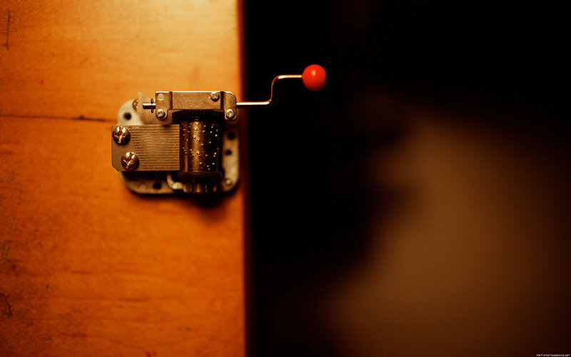 Music box mechanism on wood
