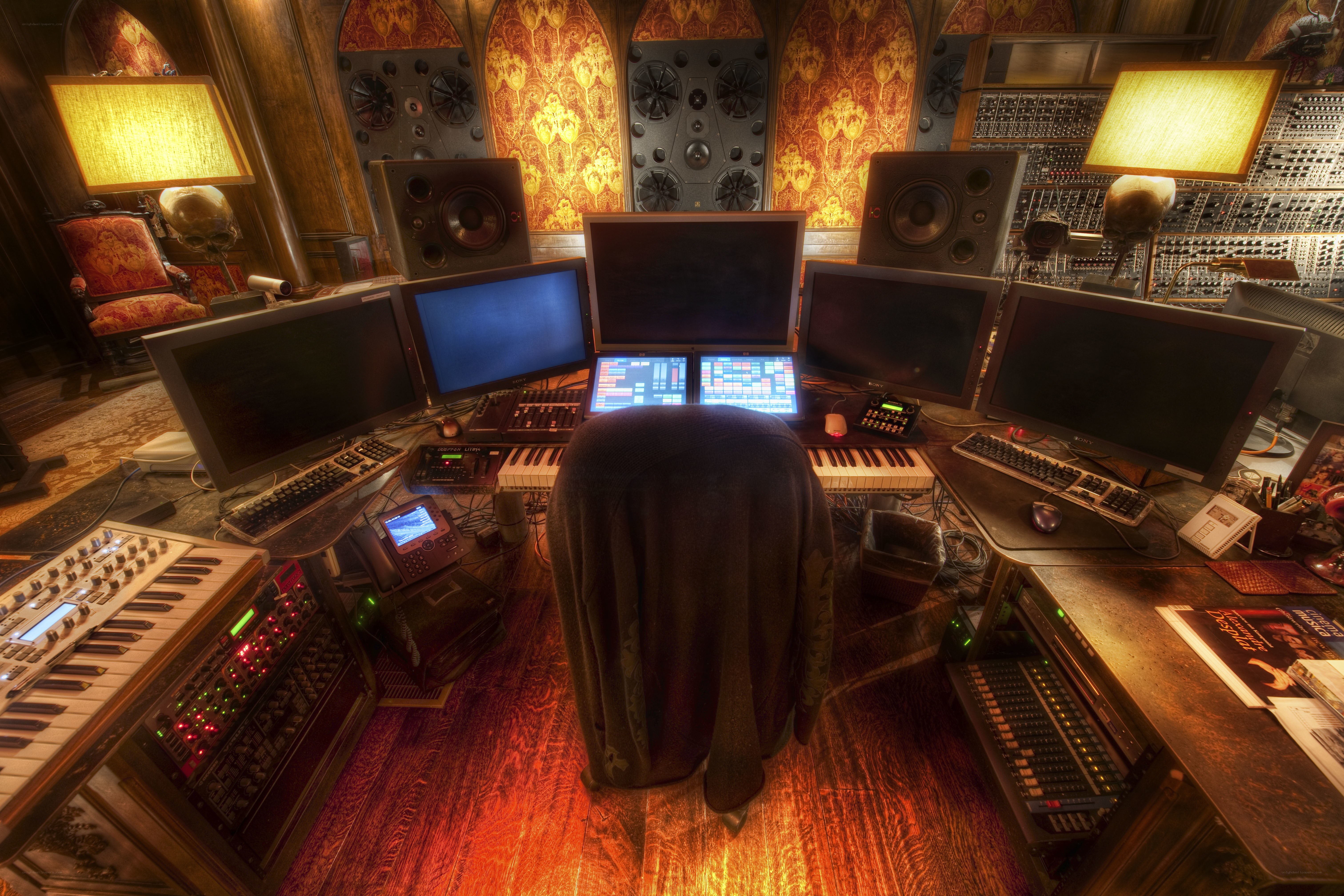 music studio with multiple monitors