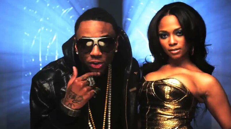 Music video still with two artists