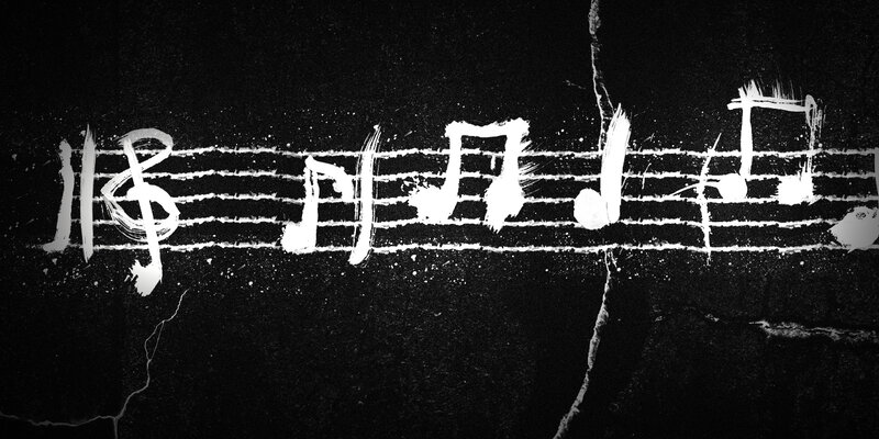musical notes on cracked surface