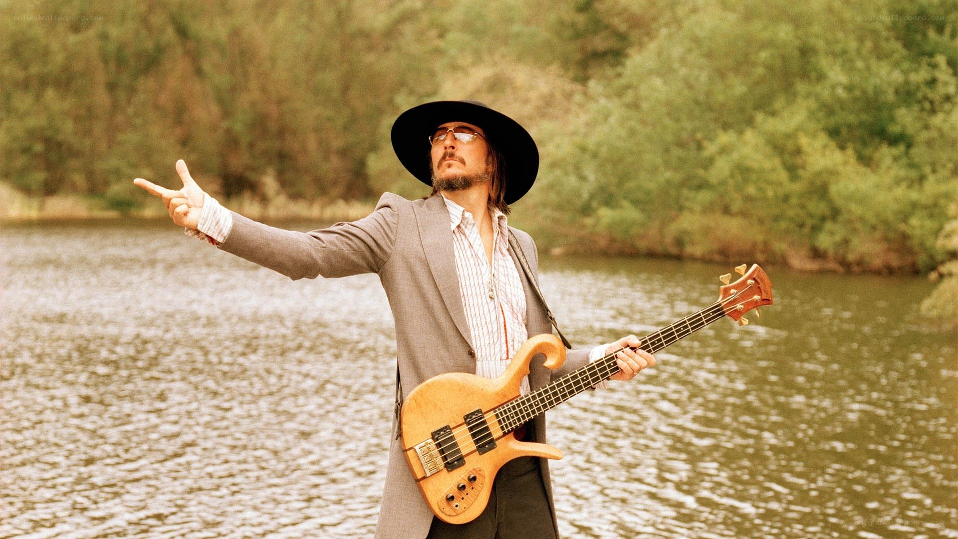 Musician by the lake