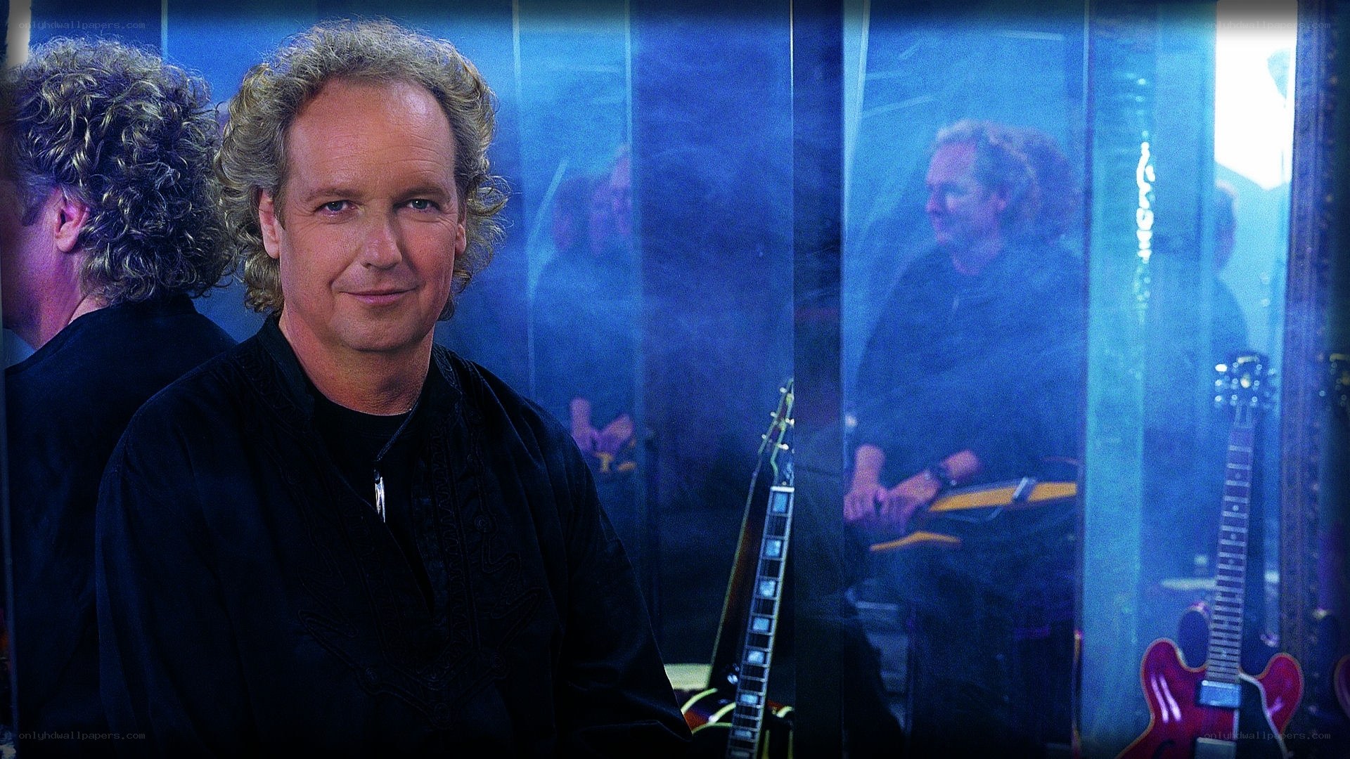 Musician in a glass display