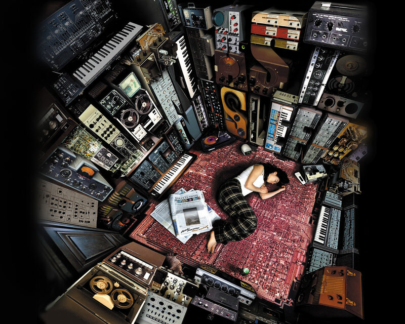 Musician in a studio of gear