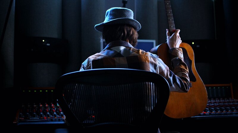 Musician in recording studio