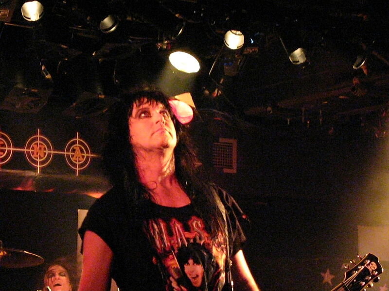 Musician on Stage — Black, Dramatic