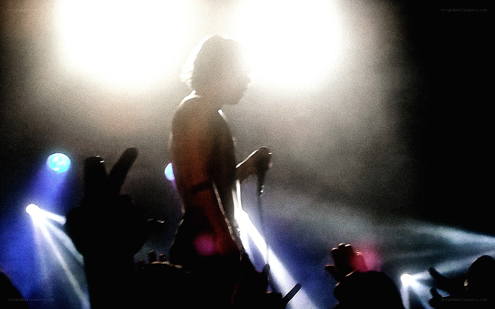 Musician on stage with crowd