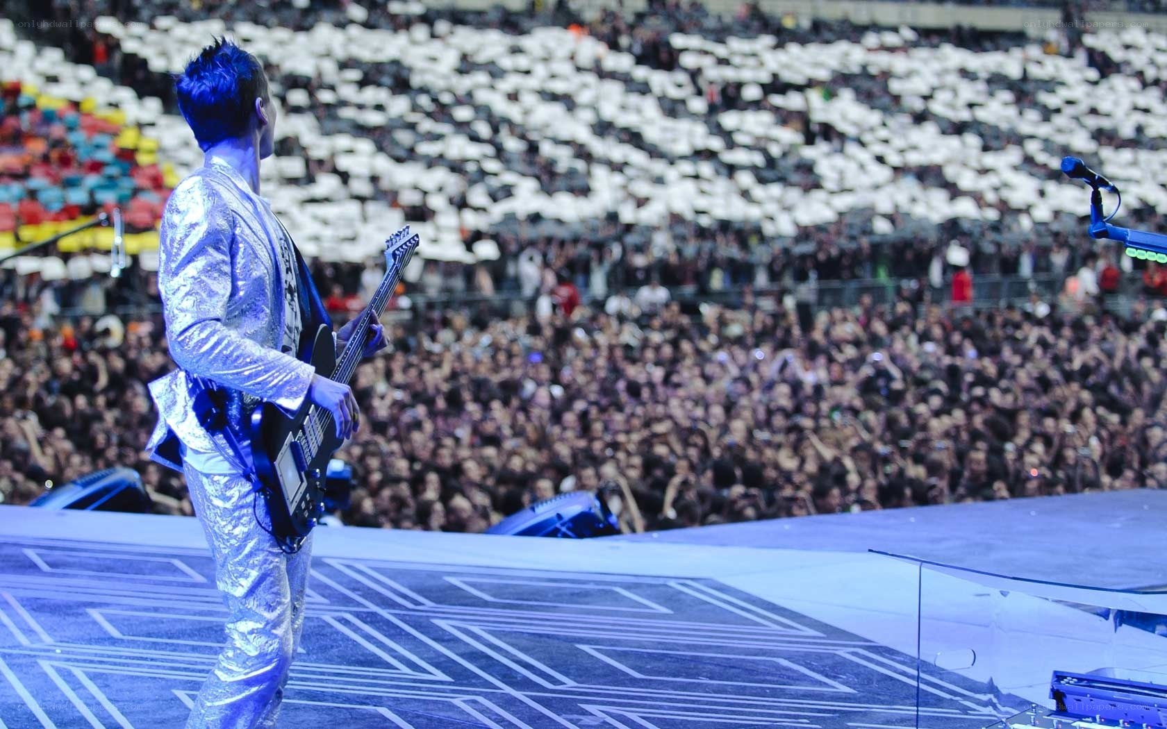Musician on stage with crowd