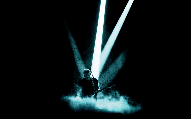 Musician on stage with spotlights