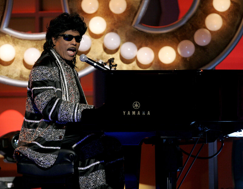 Musician performing at piano