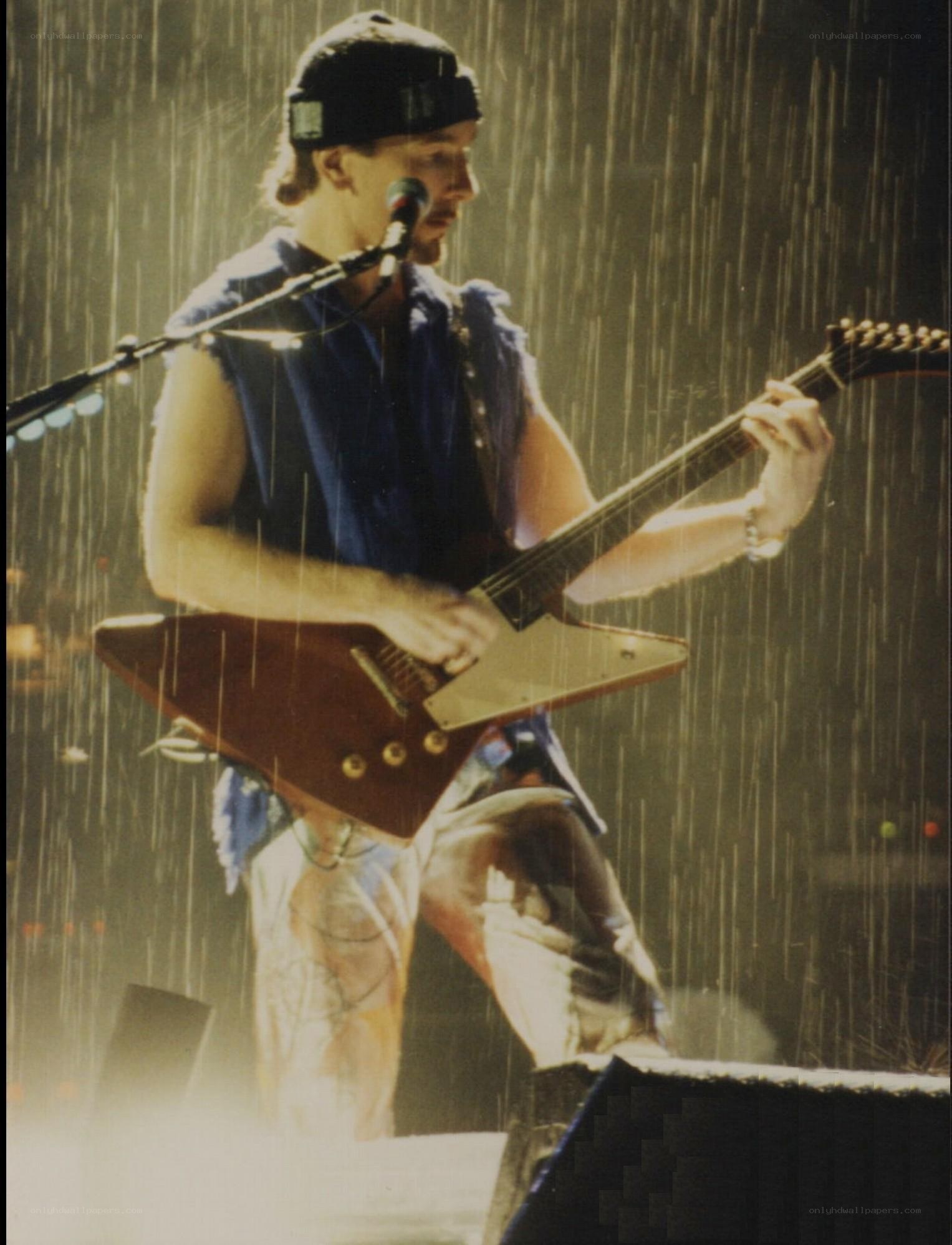 Musician performing in rain