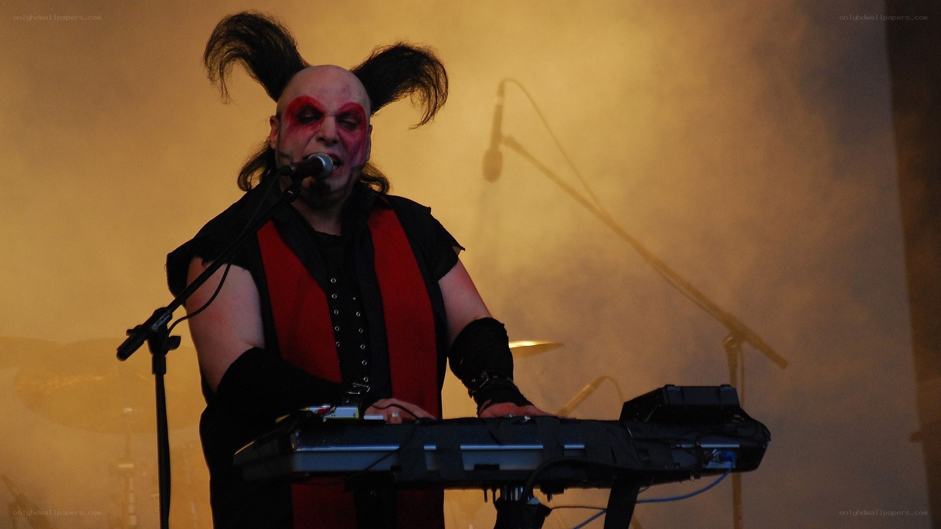 musician performing on keyboard
