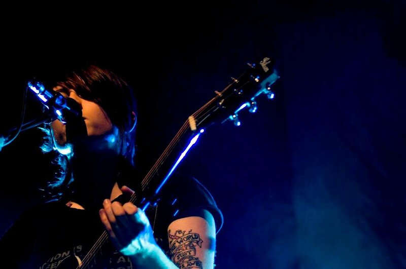 musician performing on stage
