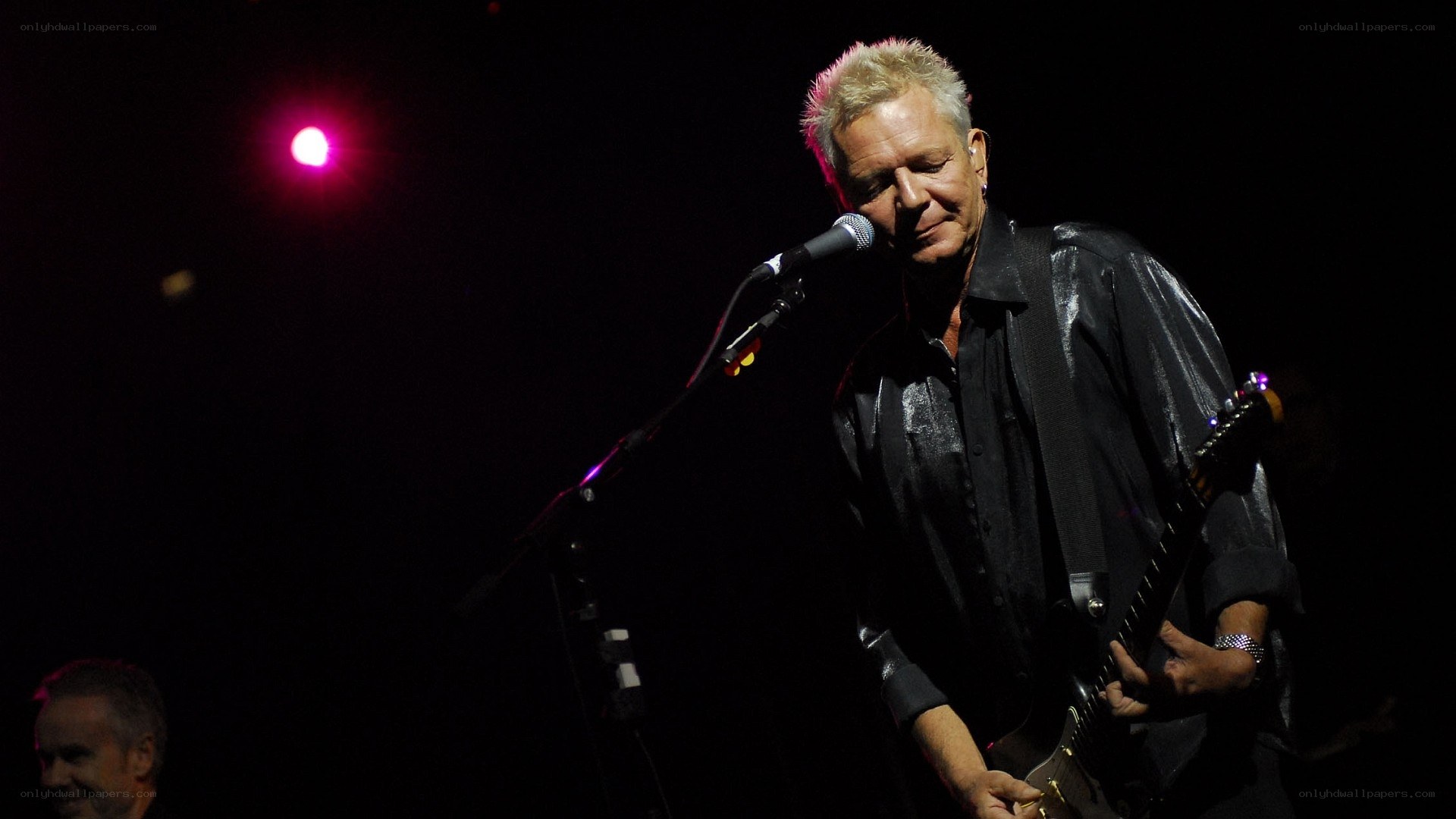 musician performing on stage