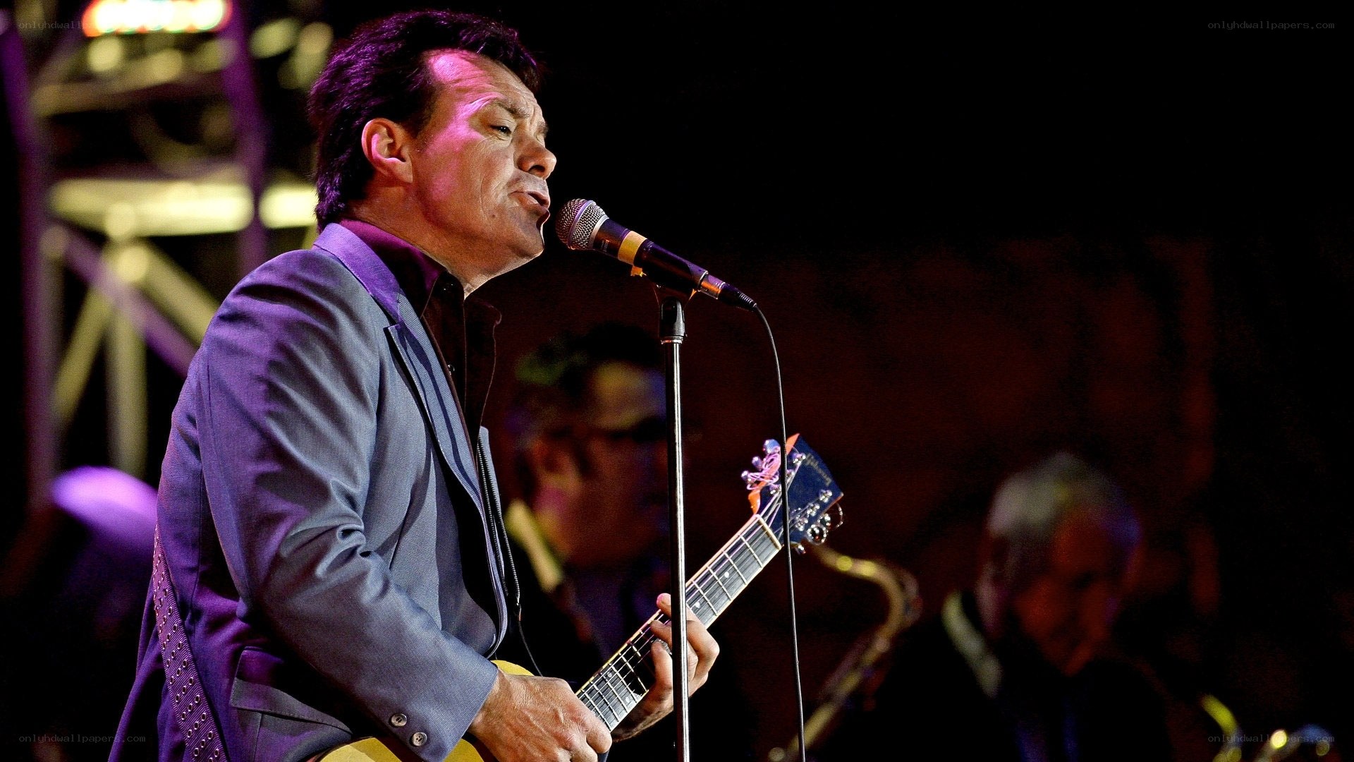 musician performing on stage