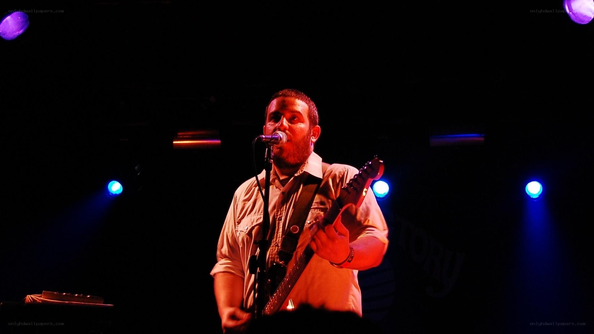 musician performing on stage