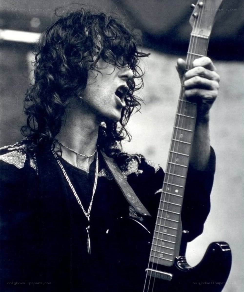 Musician performing with guitar