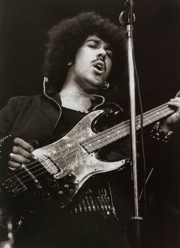 Musician playing bass guitar