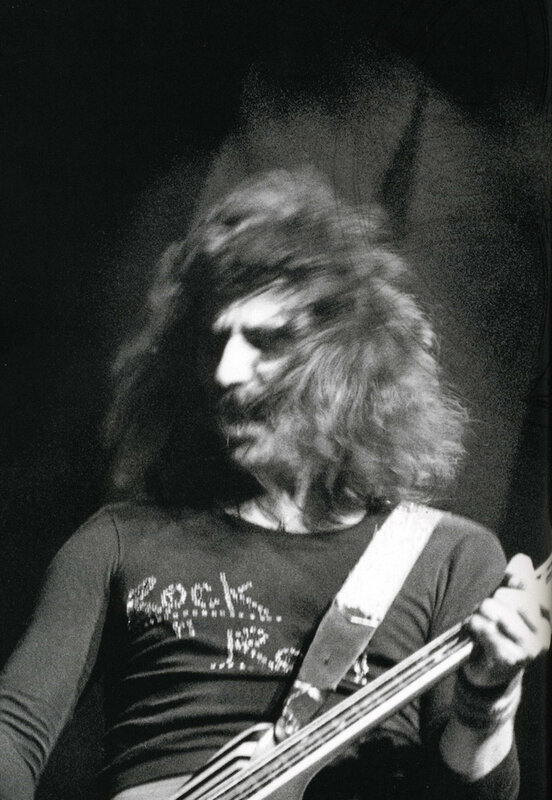 musician playing bass guitar