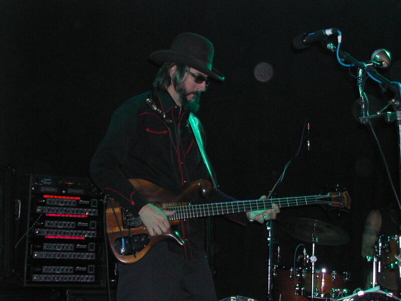 Musician playing bass guitar