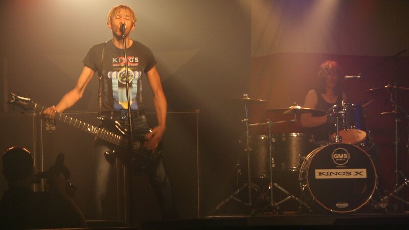 Musician Playing Bass Guitar — Black, Dramatic, Night, Photograph, Drummer