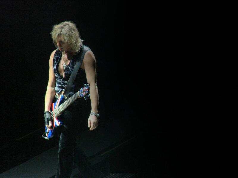 Musician Playing Bass Guitar — Black, Dramatic, Night