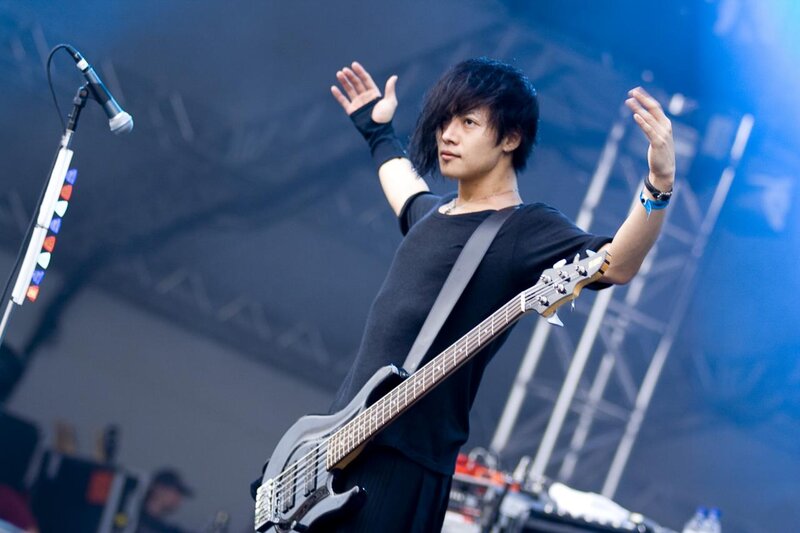Musician Playing Bass Guitar — Black, Energetic, Photograph