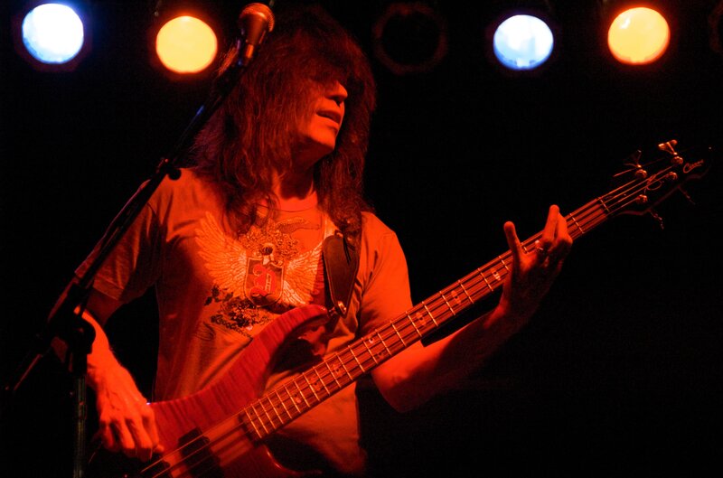 Musician Playing Bass Guitar — Red