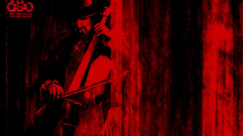 musician playing cello in red light