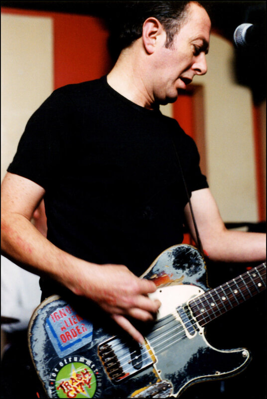 musician playing electric guitar