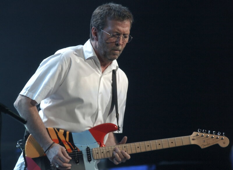 musician playing electric guitar