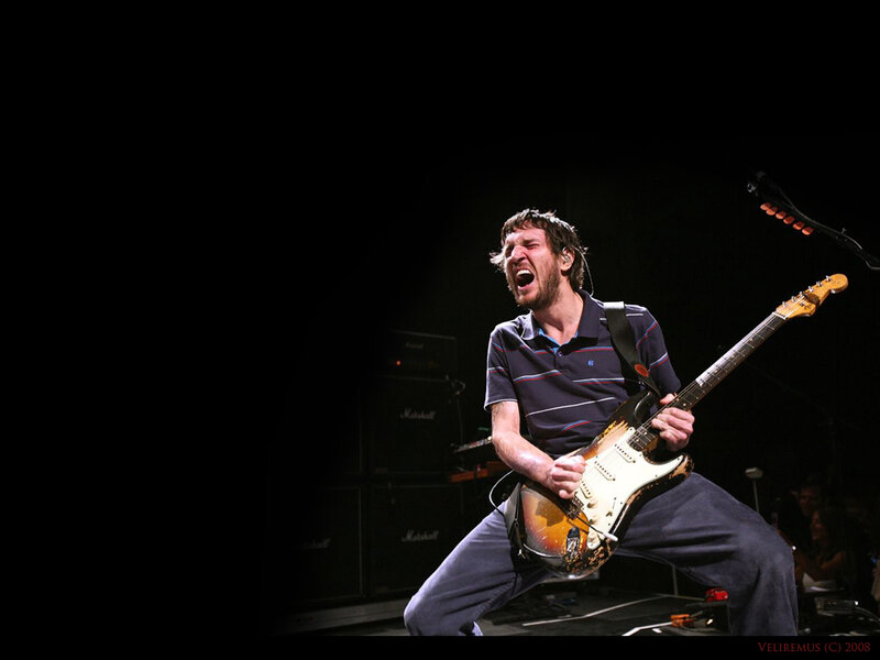 Musician playing electric guitar
