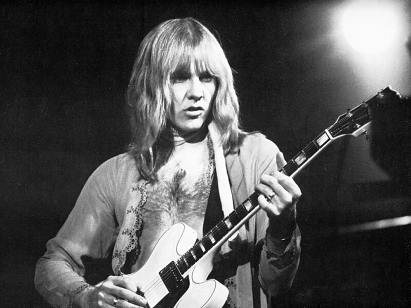 musician playing electric guitar