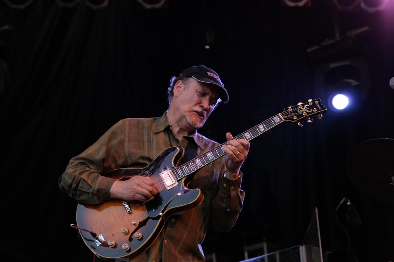 musician playing electric guitar