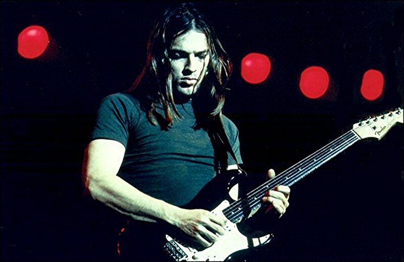 musician playing electric guitar