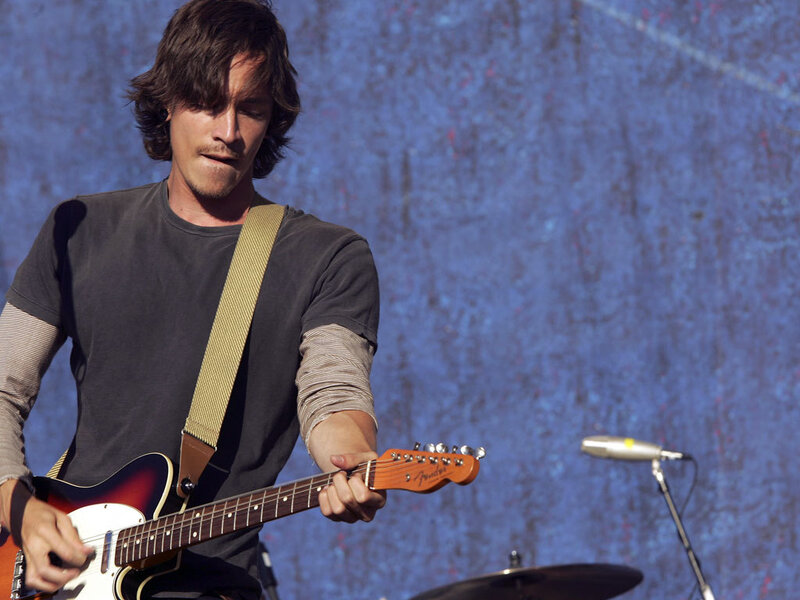 musician playing electric guitar