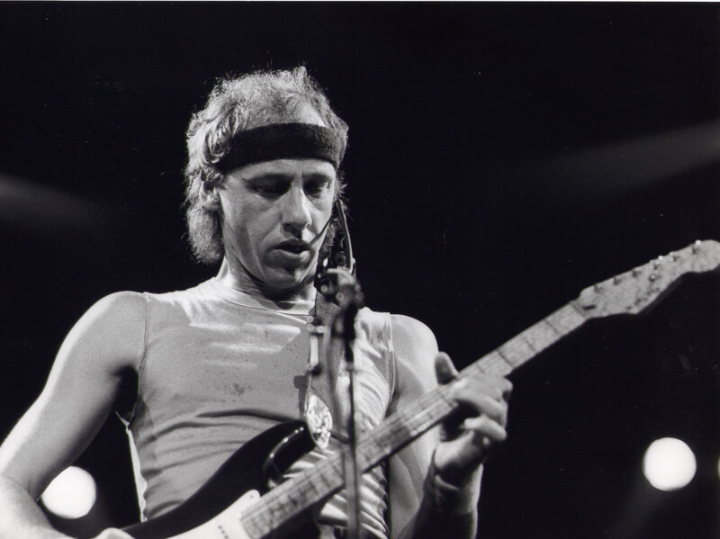 musician playing electric guitar