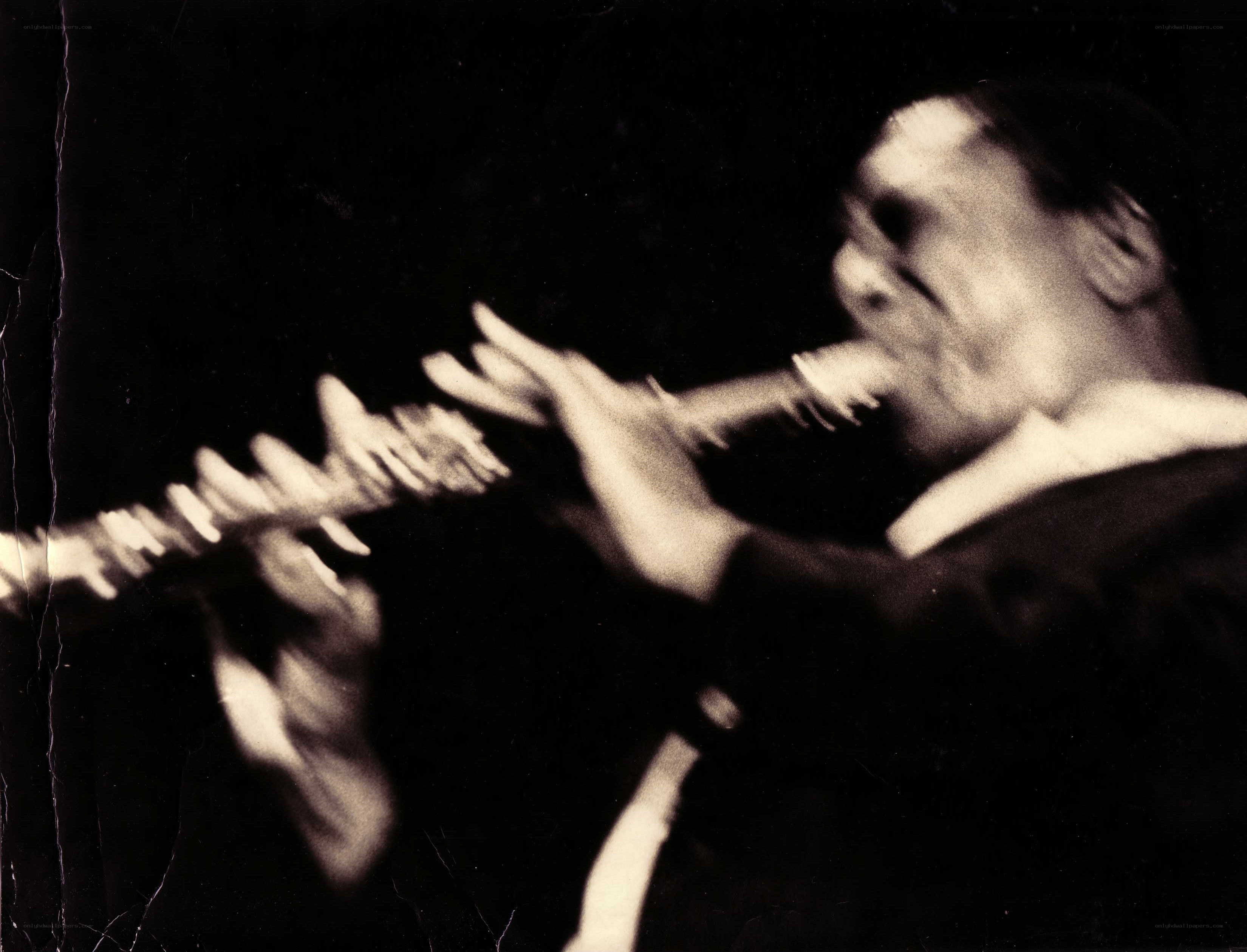 Musician playing flute in motion