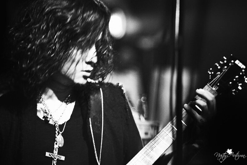 Musician Playing Guitar — Black, Dramatic, Night, Photograph, Cross Necklace