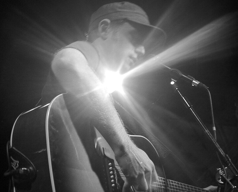 Musician Playing Guitar — Black, Dramatic
