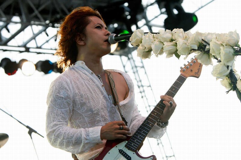Musician Playing Guitar — White