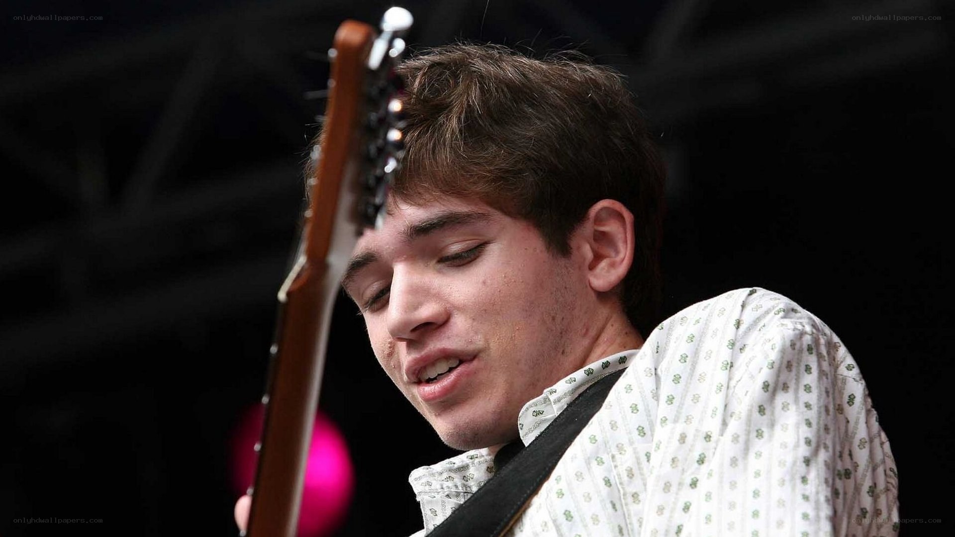 musician playing guitar