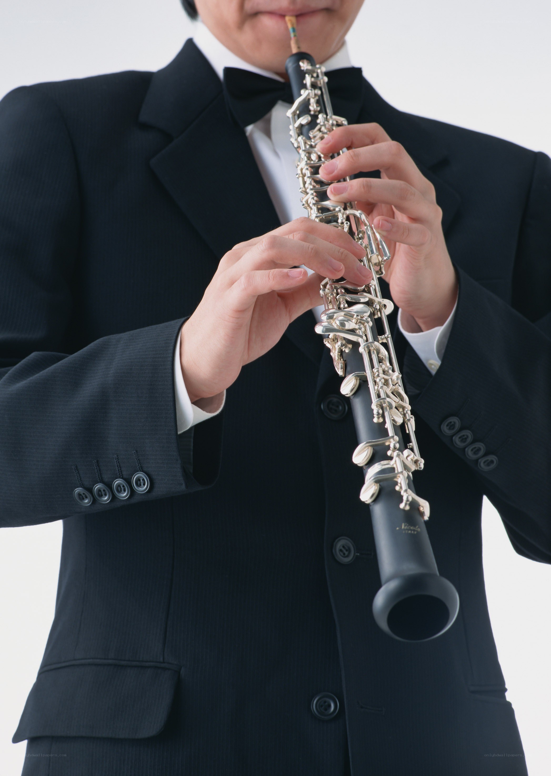 musician playing oboe