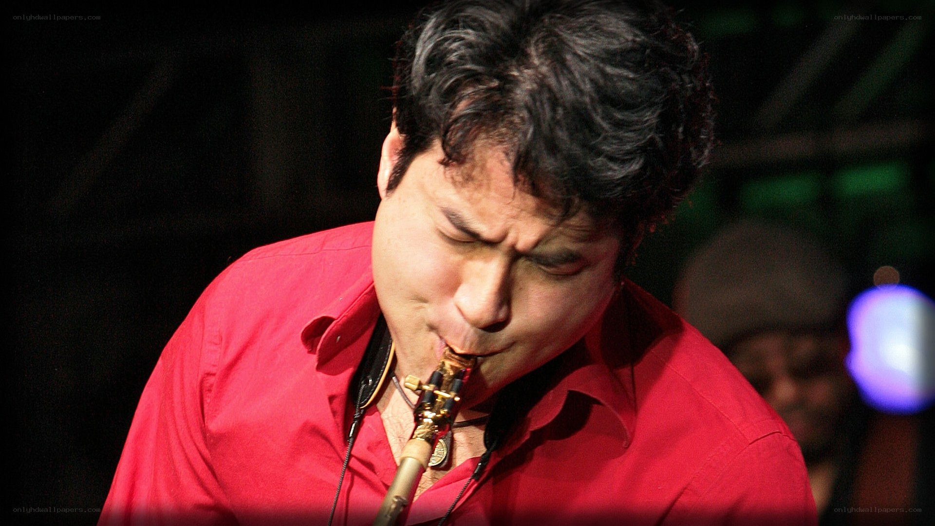musician playing saxophone