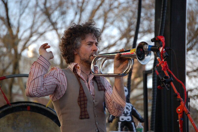 Musician playing trumpet on stage