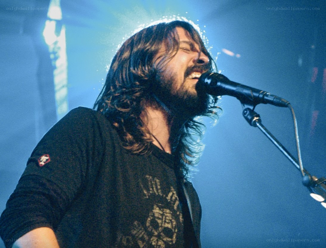 musician singing on stage