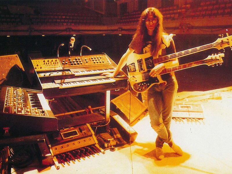 Musician with bass guitar and synthesizers